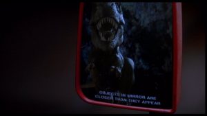 Le Tyrannosaure vu dans le rétro, célèbre plan du film Jurassic Park pour notre article sur la tendance vintage de Hollywood.
