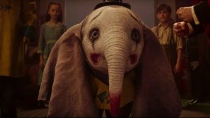 Dumbo maquillé en clown triste dans le film de Tim Burton.