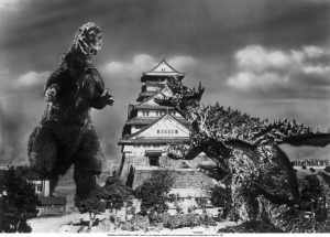 Godzilla affronte Anguirus devant un temple traditionnel japonais, scène du film Le retour de Godzilla pour notre histoire de Godzilla.