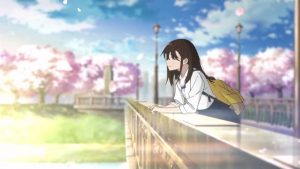Sakura penchée sur un pont, regarde l'horizon au dessus du fleuve dans le film Je veux manger ton pancréas.