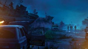 Paysage de nuit, brumeux, dans lequel quatre silhouettes lointaines avancent au milieu de plusieurs voitures calcinées, scène du film Peninsula.