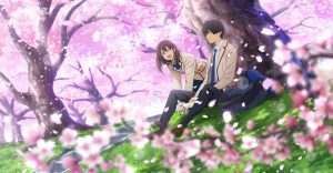 Deux amoureux lycéens sont assis au pied d'un cerisier en fleurs dans le film Je veux manger ton pancréas.