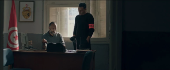 Bakma d’Abdelhamid Bouchnak : deux hommes dans un bureau de police tunisien.